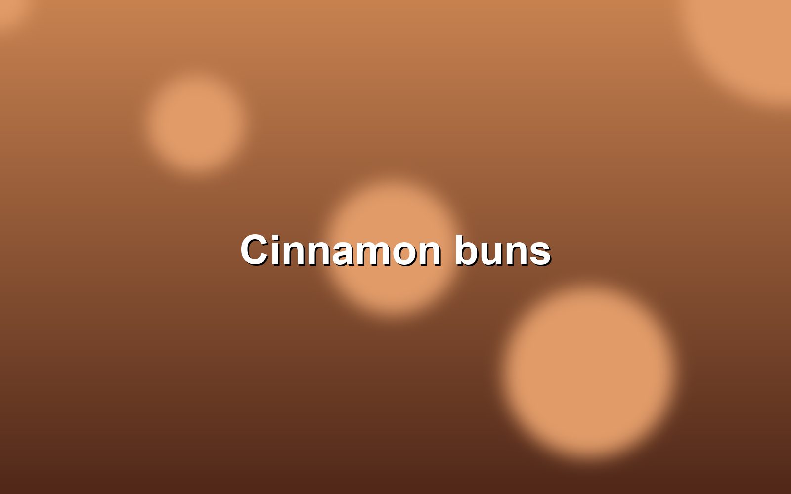 Cinnamon buns glazed with syrup