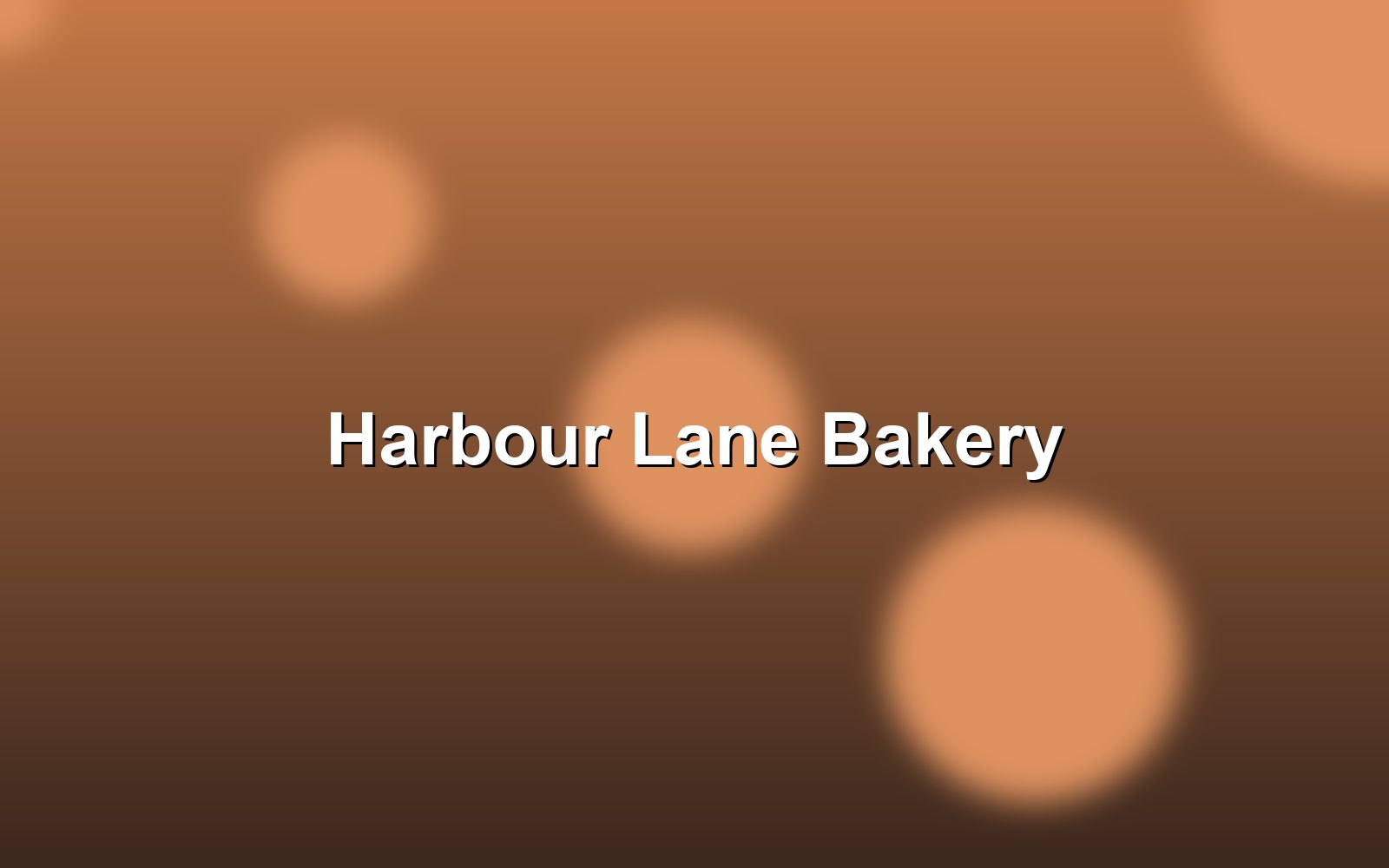 The blue front of Harbour Lane Bakery on a sunny morning
